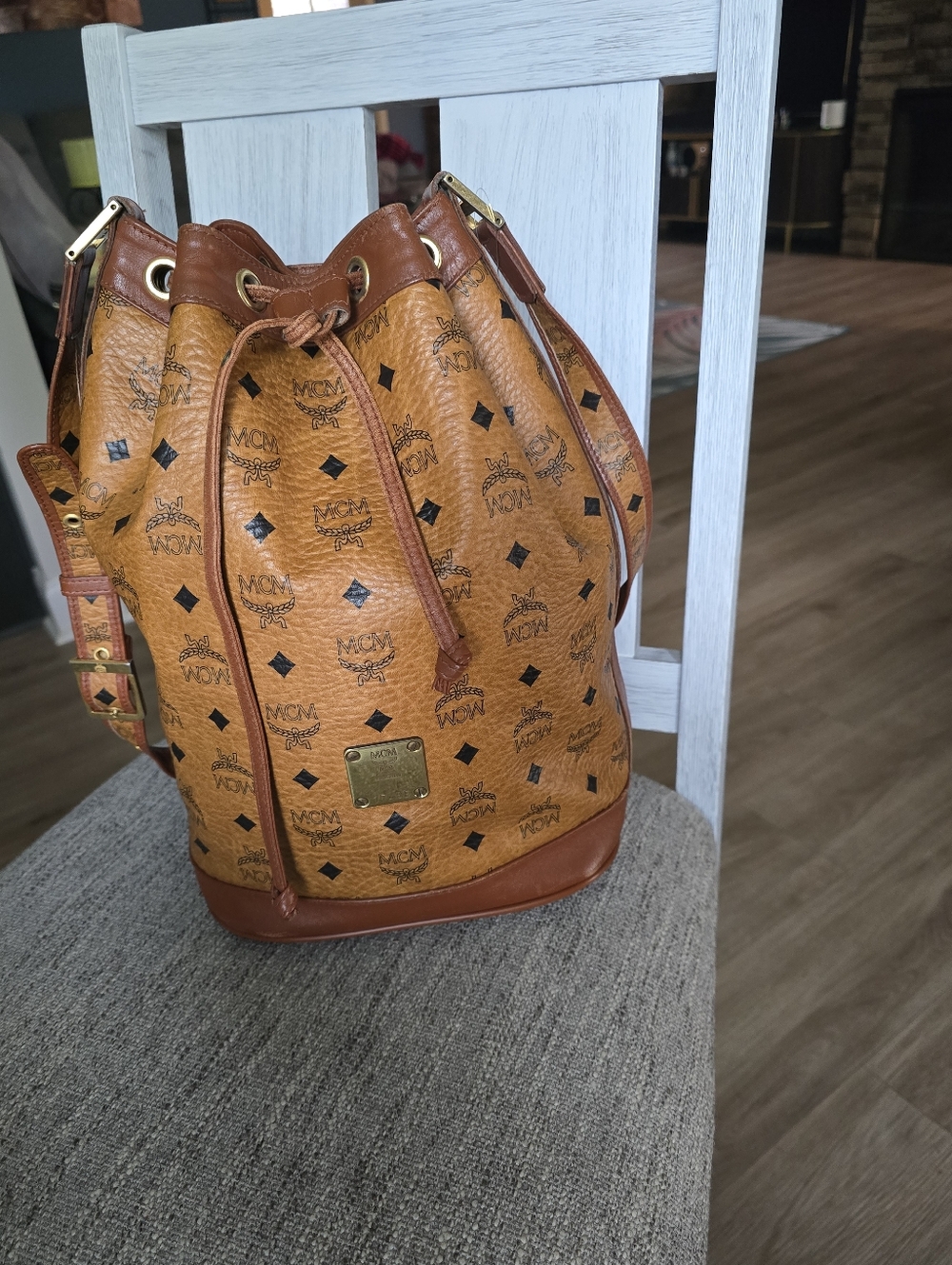 Authentic MCM Cognac Visetos Monogram Drawstring Bucket Bag